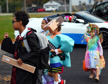 Berkley School District students walking around at Trunk or Treat events